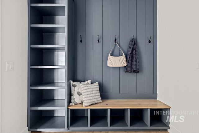 mudroom with built in shelves