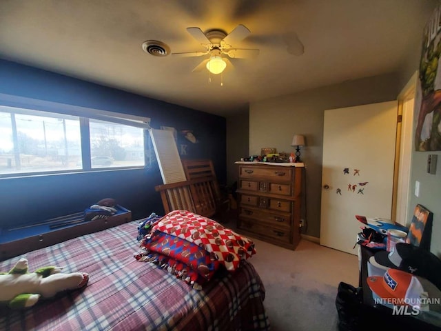 bedroom featuring ceiling fan and carpet flooring