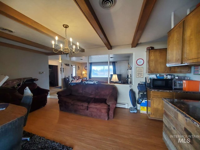 living room featuring a baseboard radiator, wood-type flooring, beam ceiling, and a notable chandelier