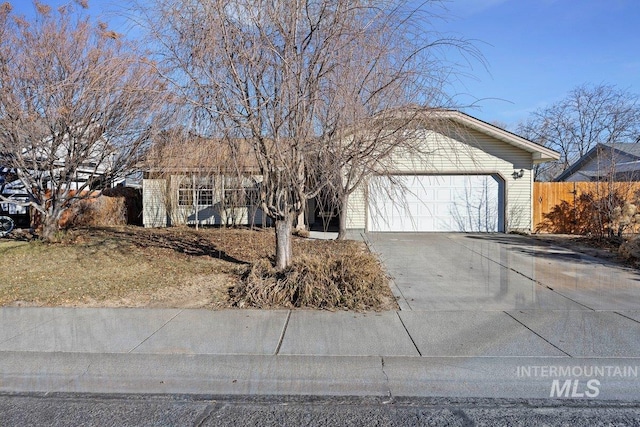 ranch-style house featuring a garage