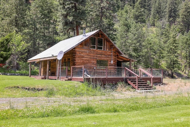 5650 Pines Rd, New Meadows, ID 83654 - log-style house with a forest view and log siding