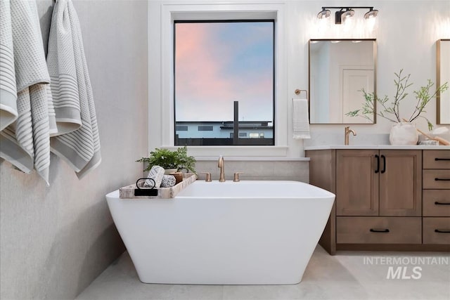 9989 W Bouvardia St, Star, ID 83699 - full bath featuring vanity and a soaking tub