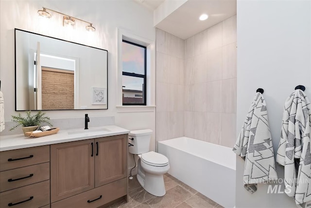 9989 W Bouvardia St, Star, ID 83699 - bathroom with vanity, toilet, and bathtub / shower combination