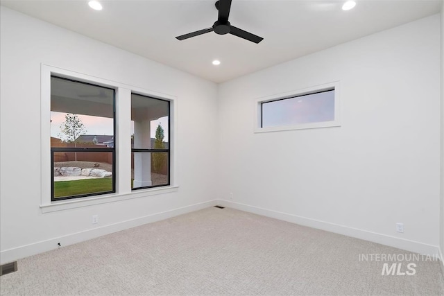 9989 W Bouvardia St, Star, ID 83699 - spare room featuring recessed lighting, light carpet, ceiling fan, and baseboards