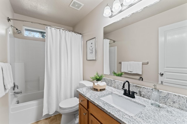 full bath with visible vents, toilet, shower / tub combo, vanity, and tile patterned flooring