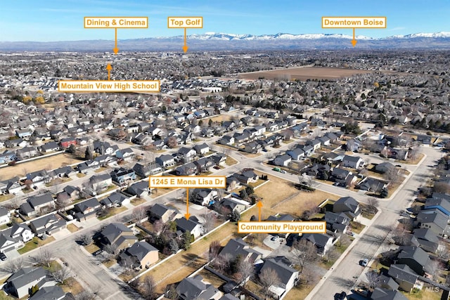 aerial view featuring a residential view and a mountain view