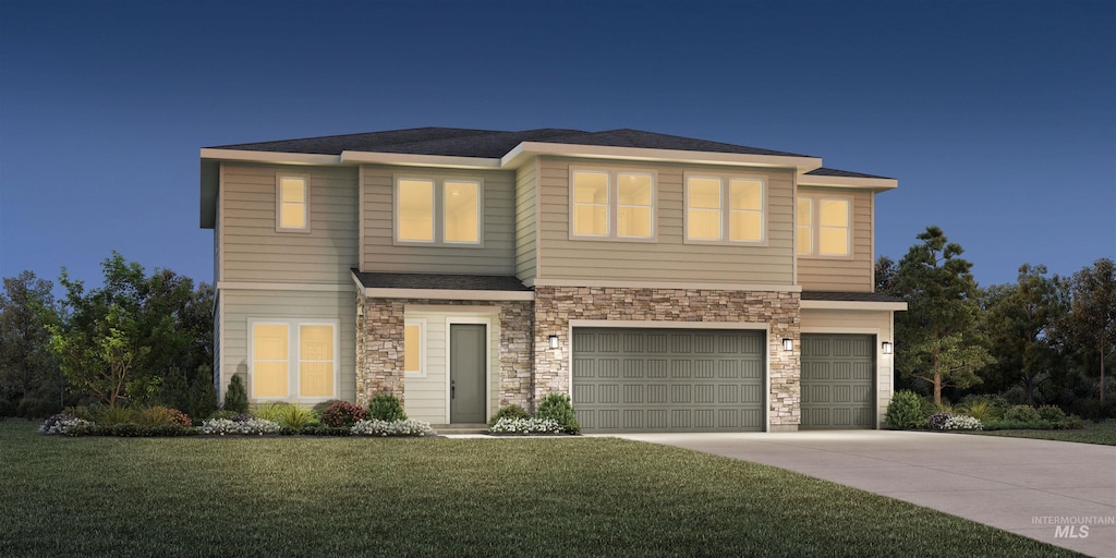 1173 N Burnam Ave, Star, ID 83669 - view of front of house featuring an attached garage, stone siding, driveway, and a front yard