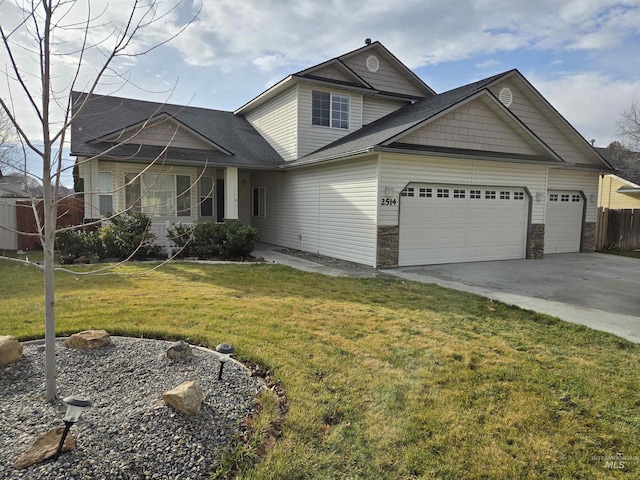 view of front facade with a front lawn and a garage