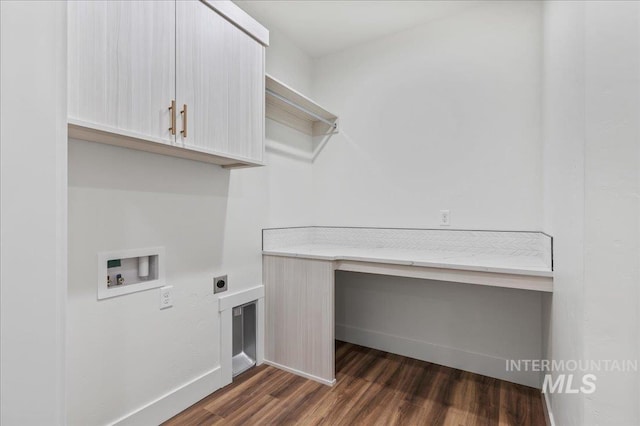 laundry room featuring washer hookup, baseboards, cabinet space, dark wood-style floors, and electric dryer hookup