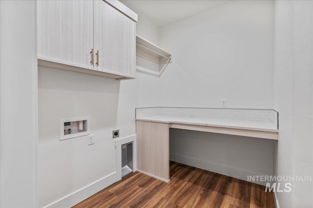 laundry area featuring hookup for a washing machine, hookup for an electric dryer, baseboards, cabinet space, and dark wood-style floors