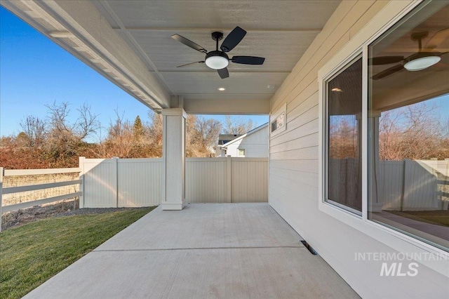 view of patio featuring ceiling fan and a fenced backyard