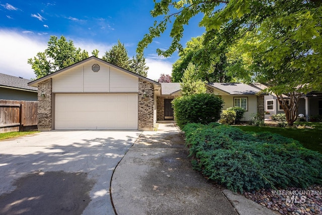 5426 W Samara Ct, Boise, ID 83703 - ranch-style house featuring driveway, a garage, and brick siding