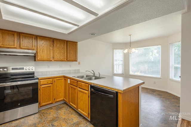5426 W Samara Ct, Boise, ID 83703 - kitchen with black dishwasher, stainless steel electric range oven, under cabinet range hood, a peninsula, and light countertops