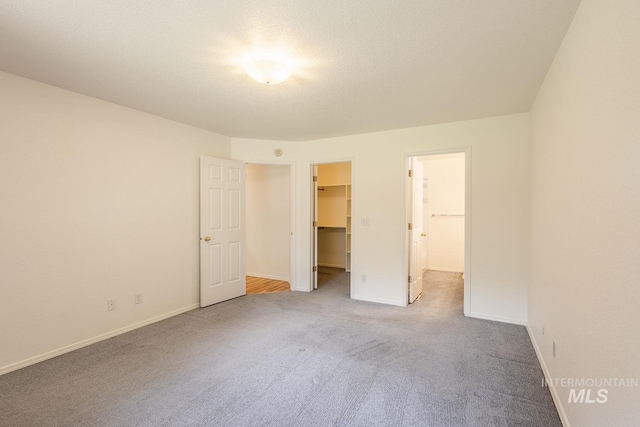 5426 W Samara Ct, Boise, ID 83703 - unfurnished bedroom with carpet, a spacious closet, and a closet