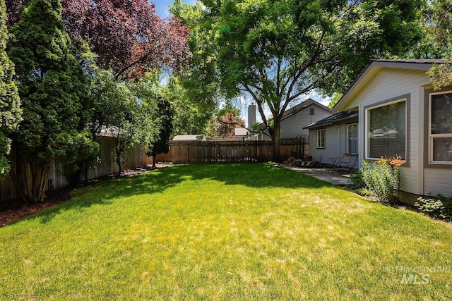 5426 W Samara Ct, Boise, ID 83703 - fenced backyard with a patio
