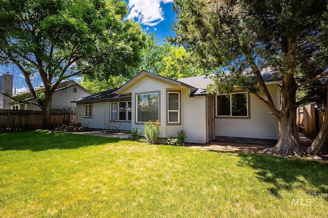 5426 W Samara Ct, Boise, ID 83703 - rear view of property with a patio and a shingled roof