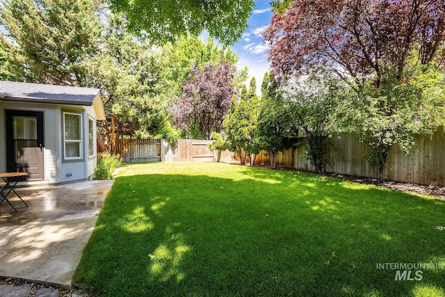 5426 W Samara Ct, Boise, ID 83703 - fenced backyard featuring a patio