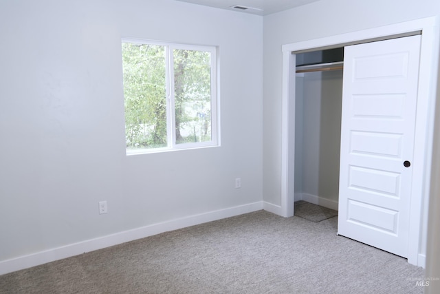 602 E Freeport St, Caldwell, ID 83605 - unfurnished bedroom with carpet flooring, a closet, and baseboards