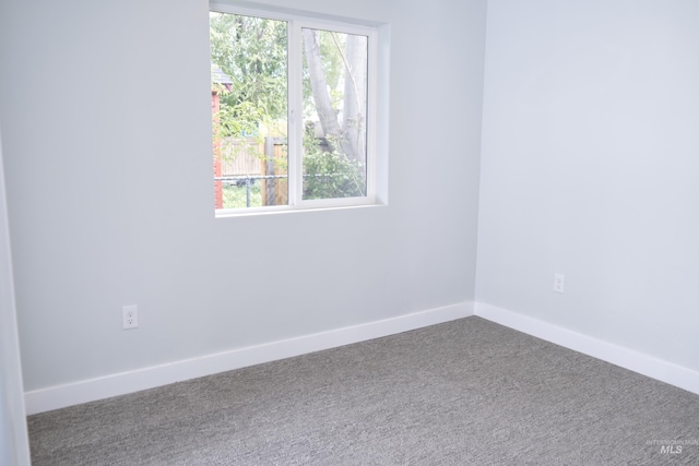 602 E Freeport St, Caldwell, ID 83605 - carpeted empty room with baseboards