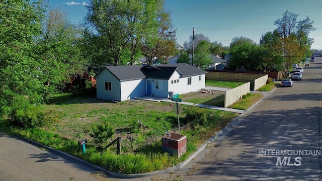 602 E Freeport St, Caldwell, ID 83605 - view of side of home featuring fence and stucco siding