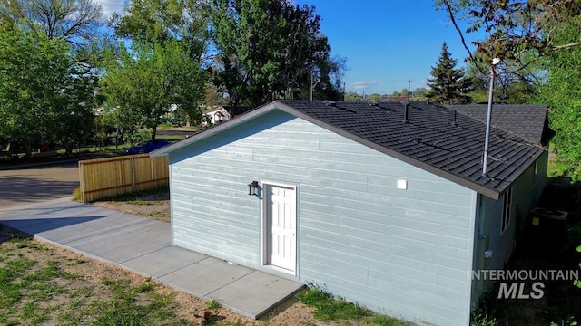 602 E Freeport St, Caldwell, ID 83605 - view of home's exterior with fence and roof with shingles
