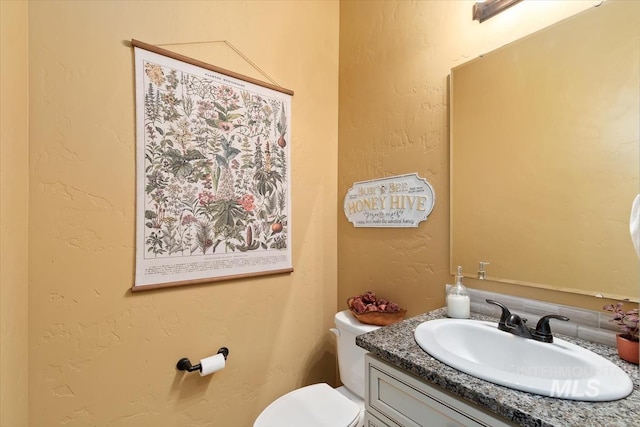 27482 Warren Ln, Wilder, ID 83676 - half bath featuring vanity and toilet
