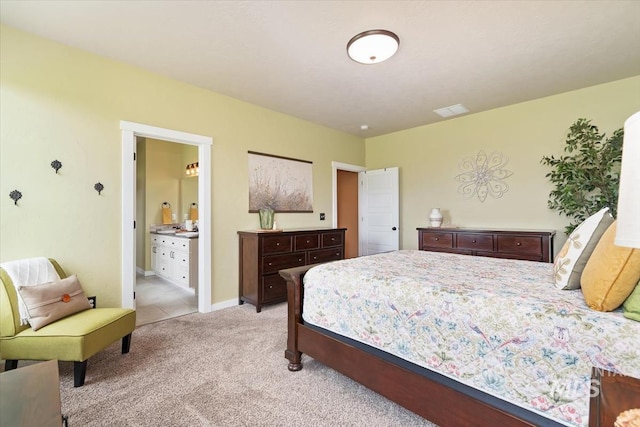 27482 Warren Ln, Wilder, ID 83676 - bedroom featuring light carpet and ensuite bathroom