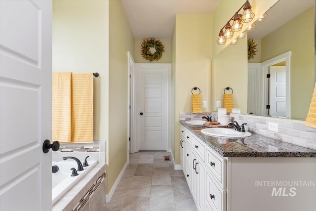27482 Warren Ln, Wilder, ID 83676 - full bath featuring double vanity, a bath, and tasteful backsplash