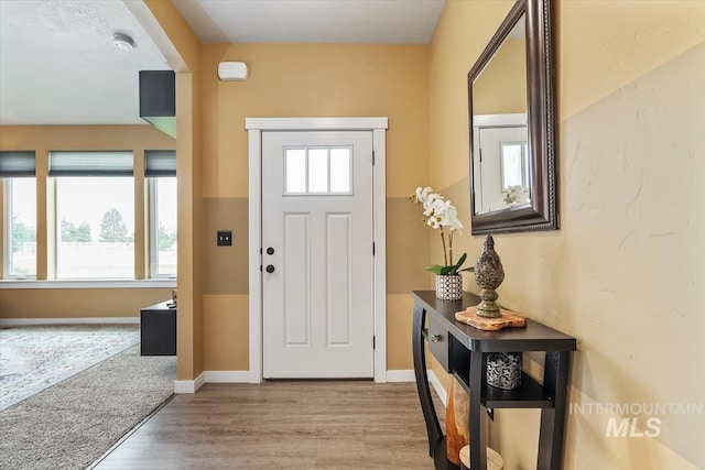 27482 Warren Ln, Wilder, ID 83676 - foyer with wood finished floors and baseboards