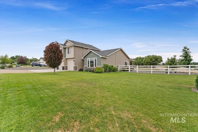 27482 Warren Ln, Wilder, ID 83676 - view of front of home with an attached garage and concrete driveway