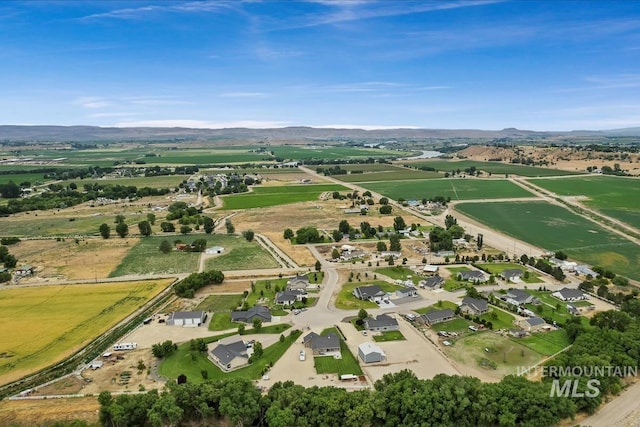 27482 Warren Ln, Wilder, ID 83676 - aerial view of property's location with rural landscape and a mountain backdrop