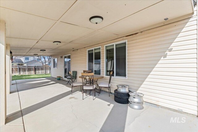 view of patio with fence