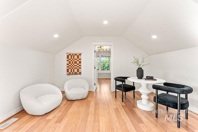 1730 W Glade Creek St, Meridian, ID 83646 - living area with light wood-type flooring, lofted ceiling, and recessed lighting