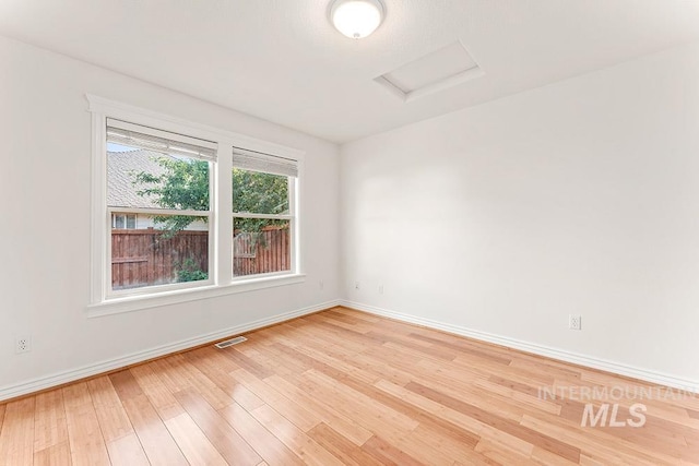 1730 W Glade Creek St, Meridian, ID 83646 - spare room with attic access and light wood-style flooring