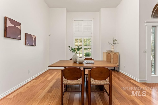 1730 W Glade Creek St, Meridian, ID 83646 - dining space with light wood-type flooring and plenty of natural light