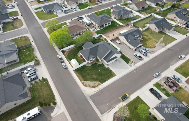 aerial view of property's location with nearby suburban area