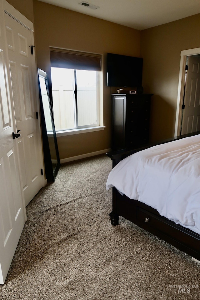 bedroom featuring carpet flooring