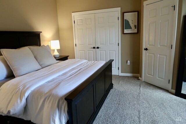 carpeted bedroom with a closet