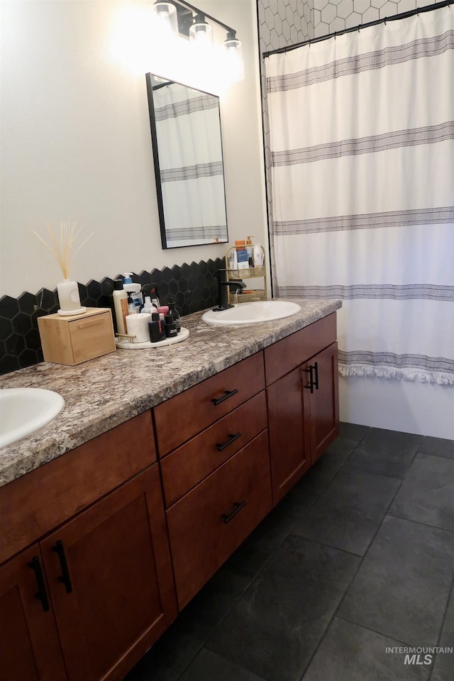 bathroom featuring tile patterned floors and vanity