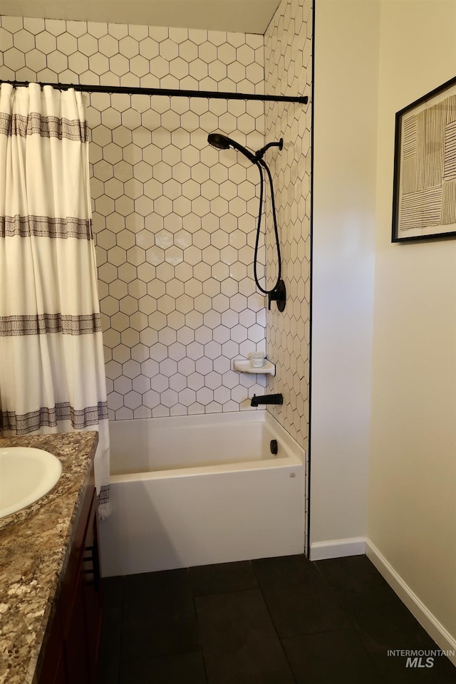 bathroom featuring shower / tub combo with curtain, vanity, and tile patterned flooring