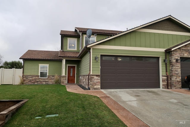 craftsman inspired home with a front yard and a garage