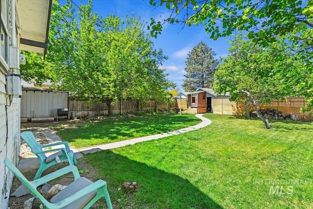 519 S 5th Ave, Nampa, ID 83651 - fenced backyard with an outdoor structure