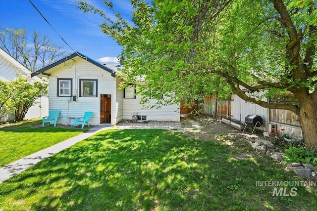 519 S 5th Ave, Nampa, ID 83651 - back of property featuring a fenced backyard