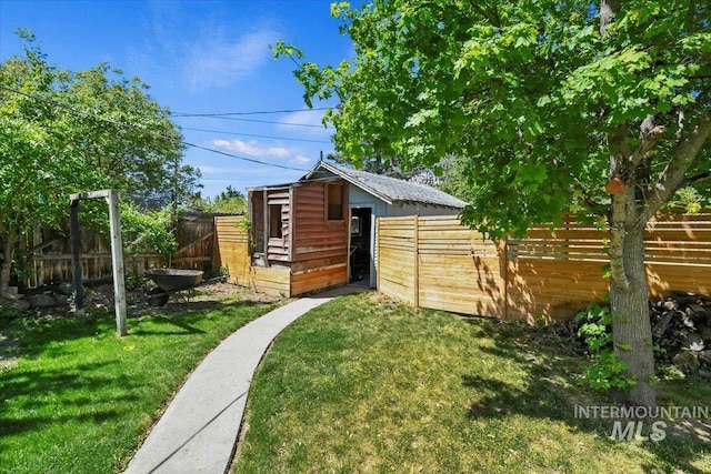 519 S 5th Ave, Nampa, ID 83651 - fenced backyard with an outdoor structure