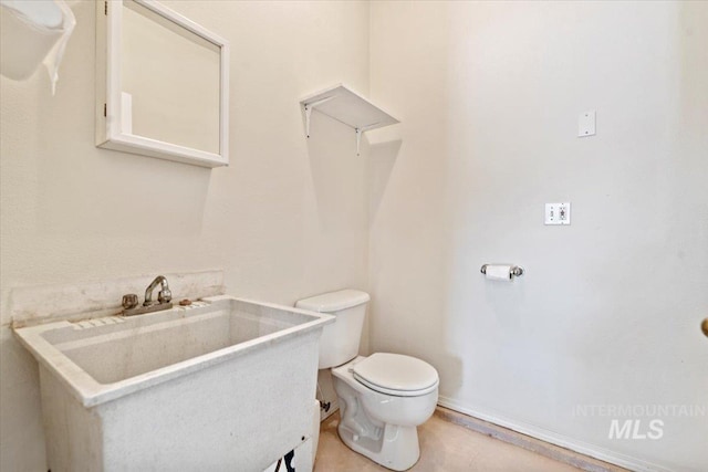 half bath with vanity and toilet