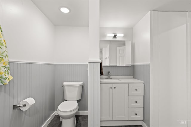 bathroom with vanity and toilet