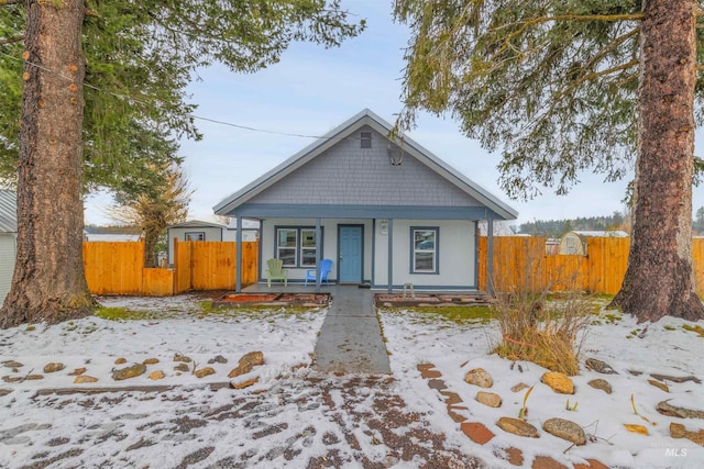 bungalow-style house featuring covered porch