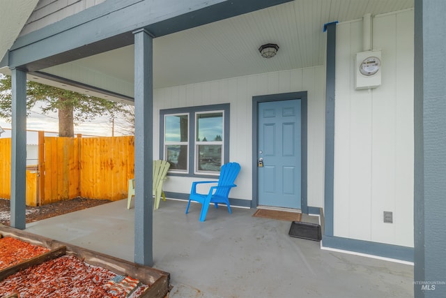 entrance to property featuring a patio area