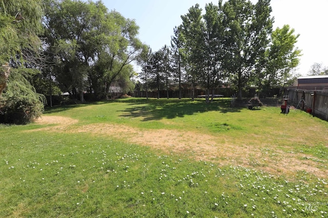 view of yard with fence