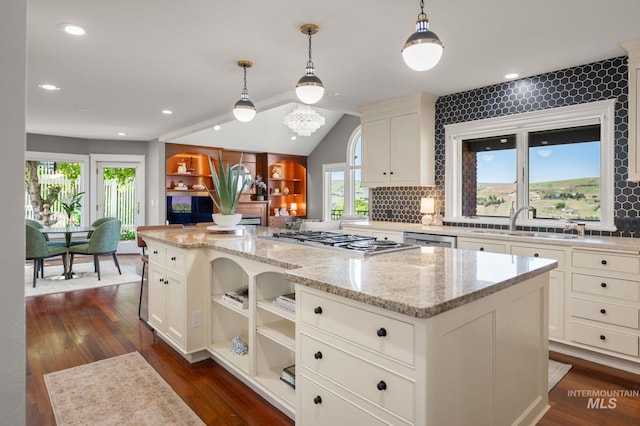 176 Marine View Dr, Lewiston, ID 83501 - kitchen with a sink, appliances with stainless steel finishes, healthy amount of natural light, a kitchen island, and lofted ceiling